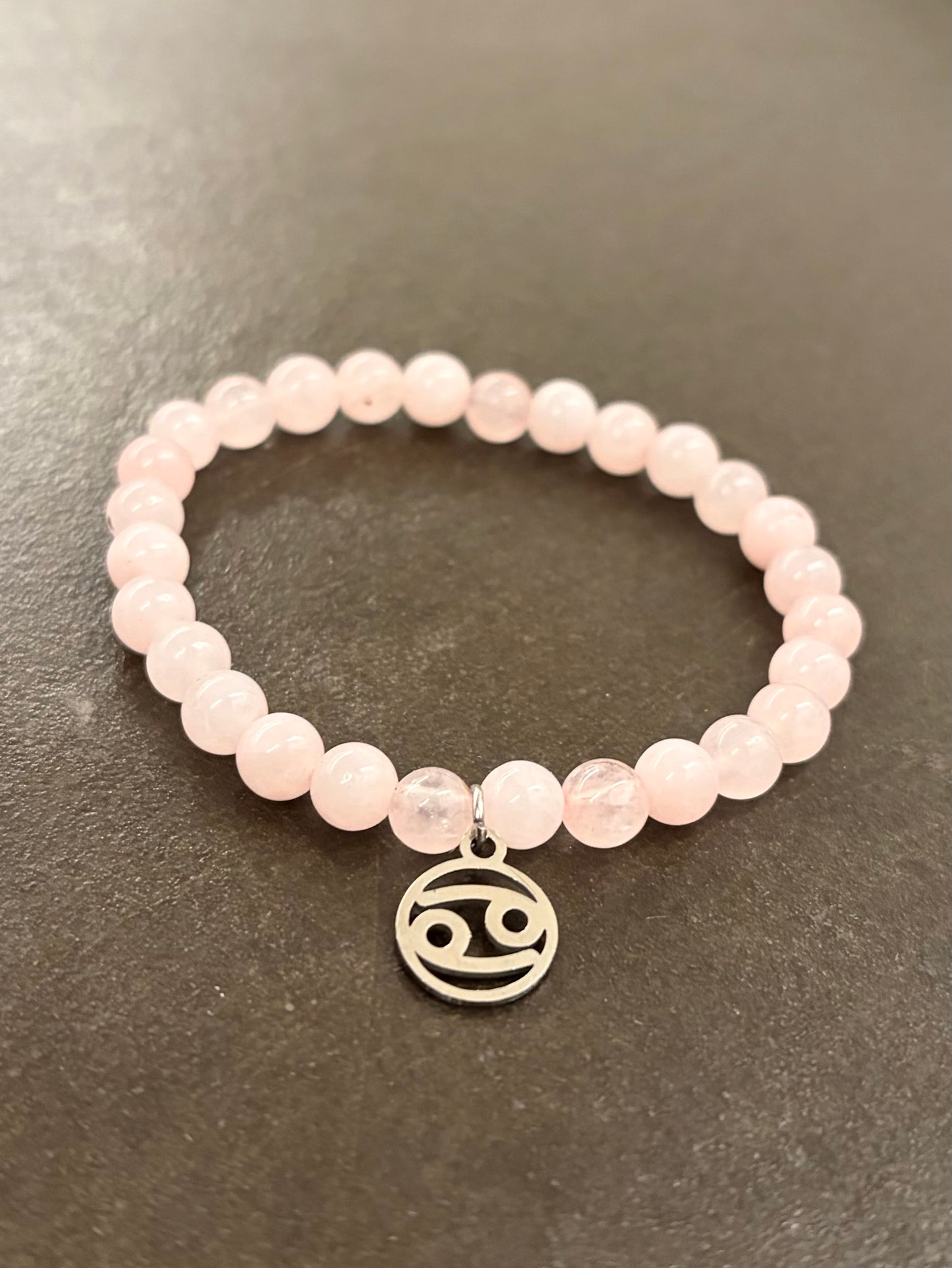 Krebs-Rosenquarz-Perlenarmband